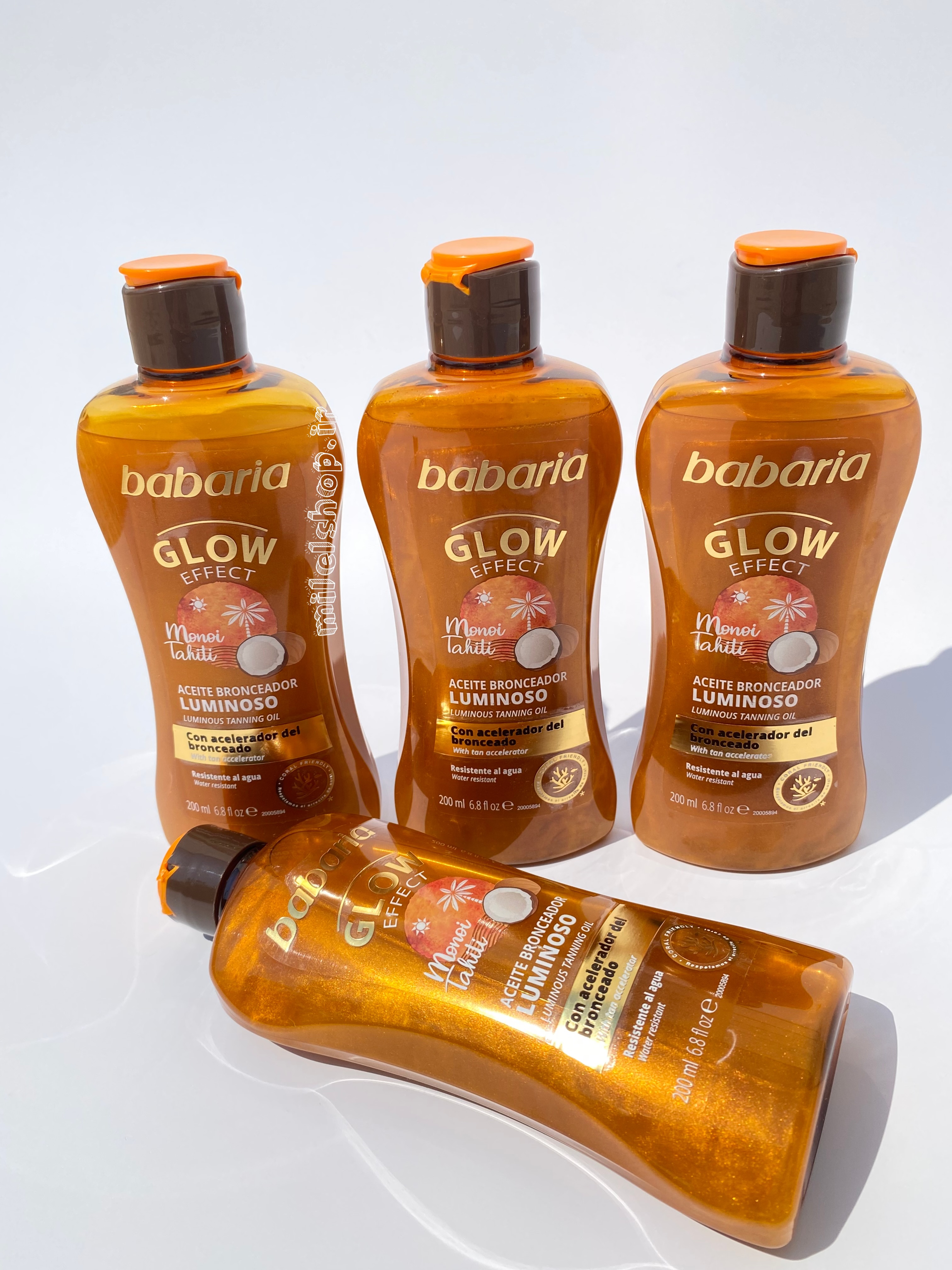 روغن برنزه کننده شاین دار باباریا Glow Effect مدل Monoi Tahiti حجم 200 میلی‌لیتر